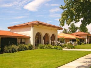 A grassy area in front of Las Colinas